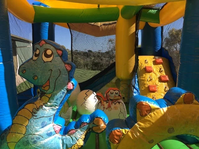 dinosaur kingdom obstacle bouncy castle inside view