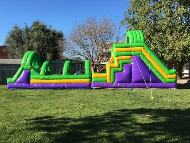 Large interactive inflatable for hire setup outside two parts