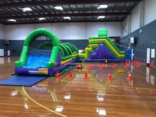 Obstacle course jumping castle inside a sports centre