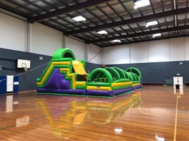 Large interactive obstacle course setup inside a hall / sport function centre