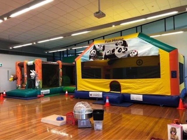 Hall hire Thebarton community centre with a jumping castle inside