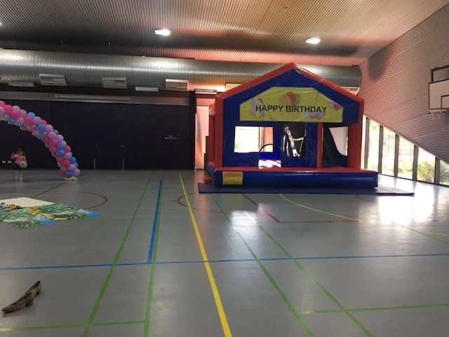 Seaford community centre, with a jumping castle inside