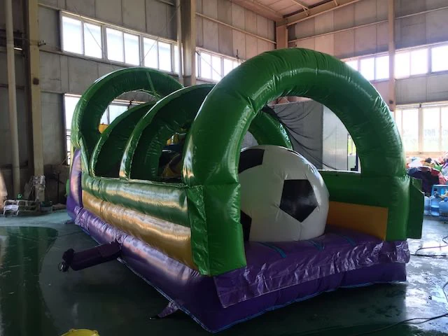 obstacle course jumping castle inside a gym