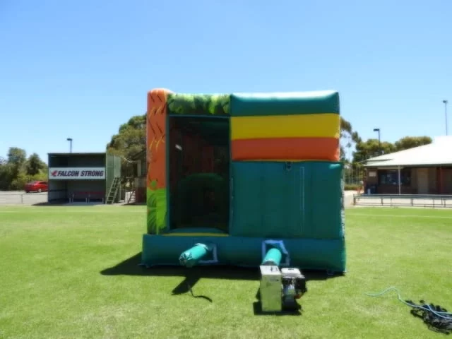 Obstacle course jumping castle jungle animals theme back view