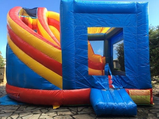 Round slide jumping castle front view